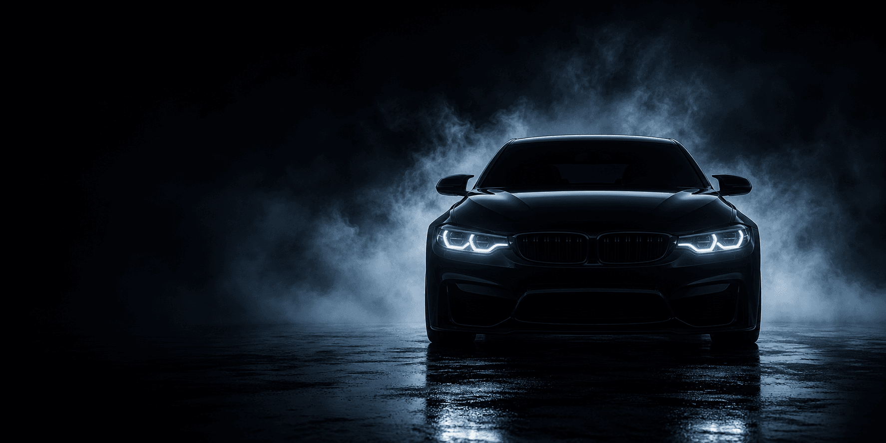 Cinematic black sport sedan with tinted windows and headlights